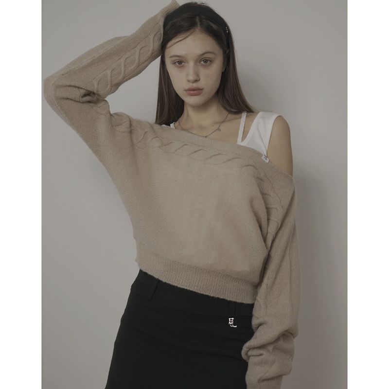 Bellialeu（ベルリアル）の「CABLE BOAT NECK KNIT-BEIGE（Tops）」