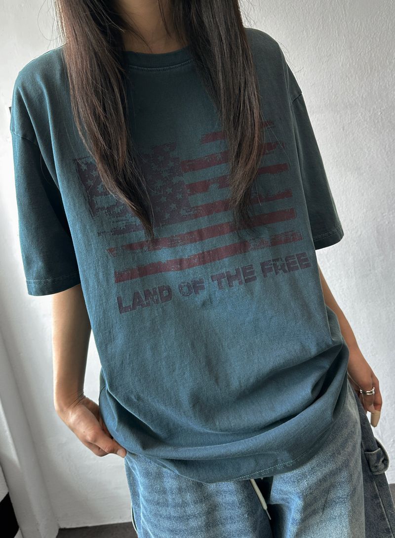 CCORTTI（コルッティ）の「ユナイテッドフラッグ ピグメント オーバーサイズTシャツ - 3カラー（トップス）」