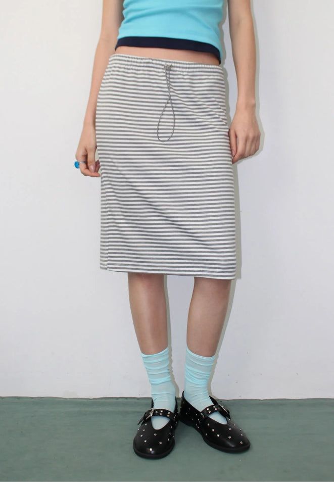 AAKE(アケ)の「STRIPE STRING MIDI SKIRT(Skirts)」
