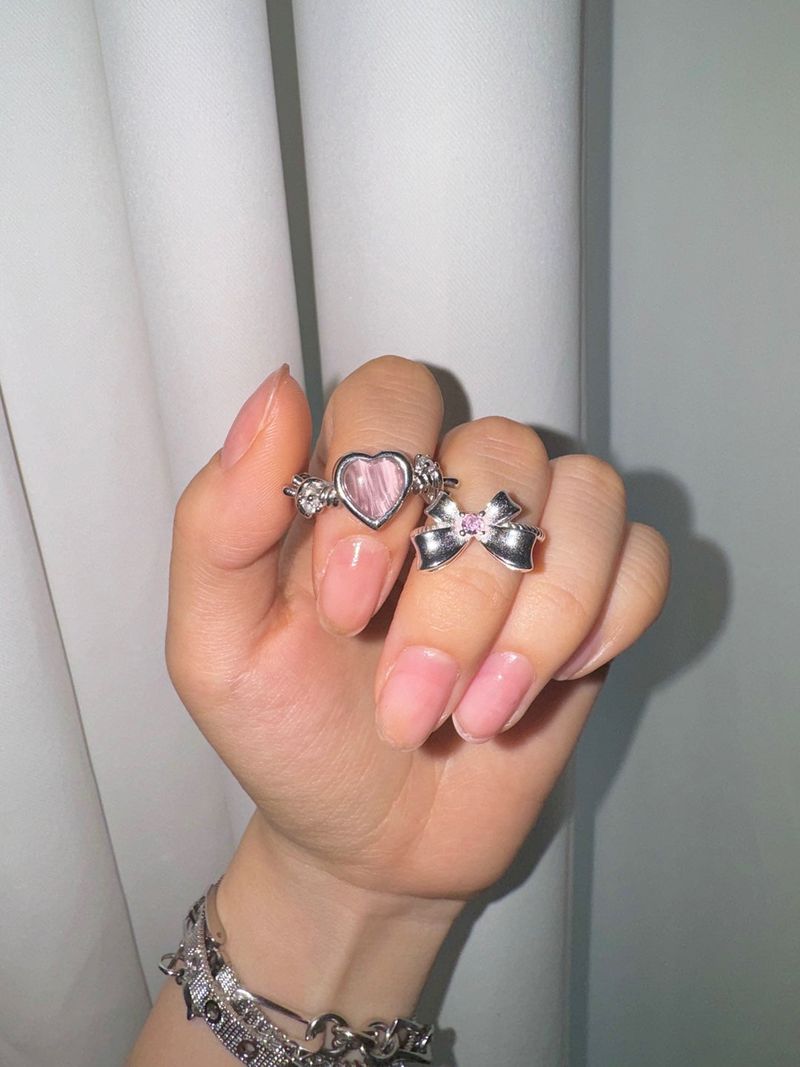 Pink heart angel ring
