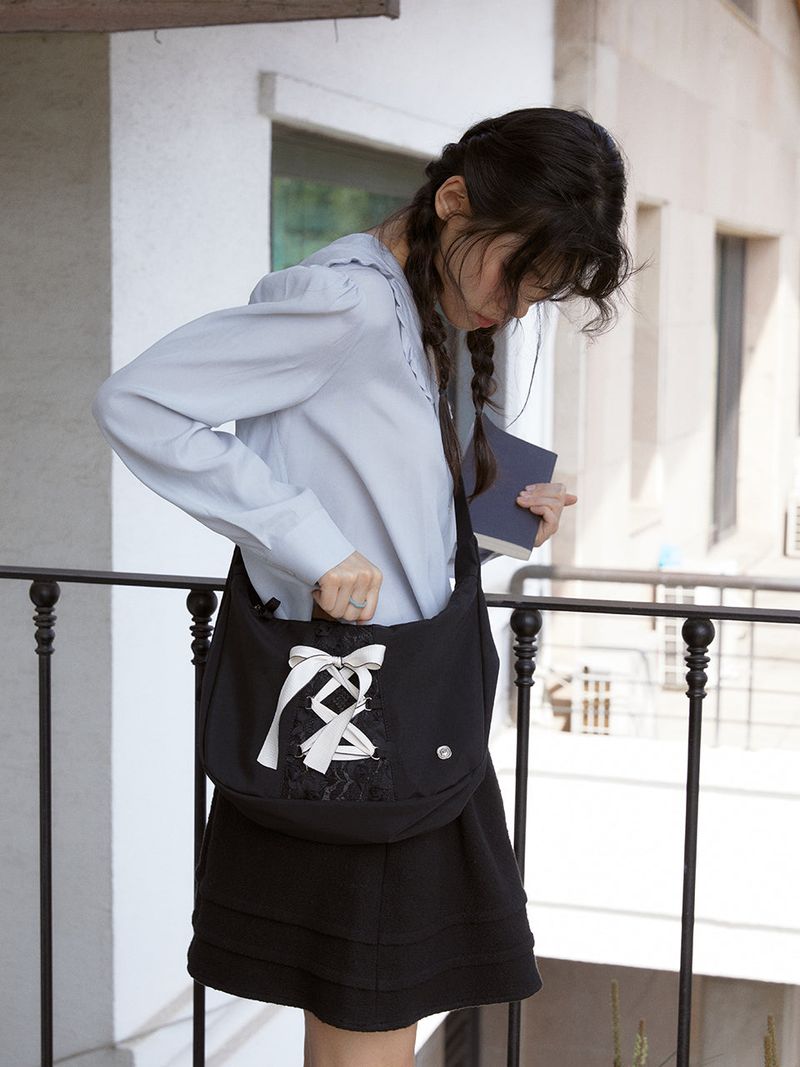 ovuni（オーブニ）の「Daily ribbon hobo bag_black（Bags）」