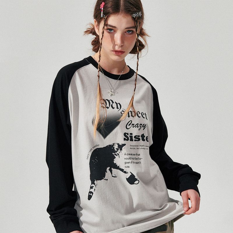 wonder visitor（ワンダービジター）の「Cat Raglan Long sleeve [2 Color]（Tops）」