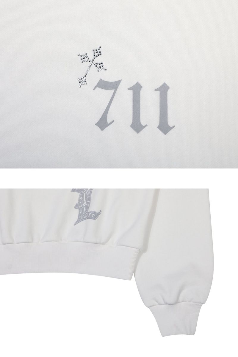 SPELL OFF-SHOULDER SWEATSHIRT white