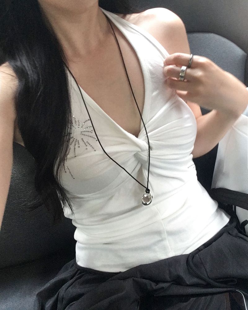 Cubic twisted sleeveless