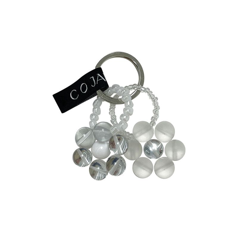 cojanta（コジャンタ）の「ブラックフラワーリング20（トイ/キーホルダー）」