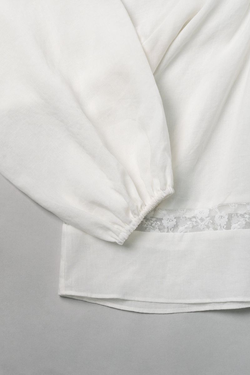 Pale lace blouse