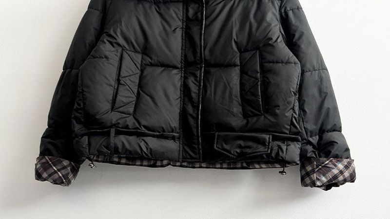 Pomi checkered lining padded jumper