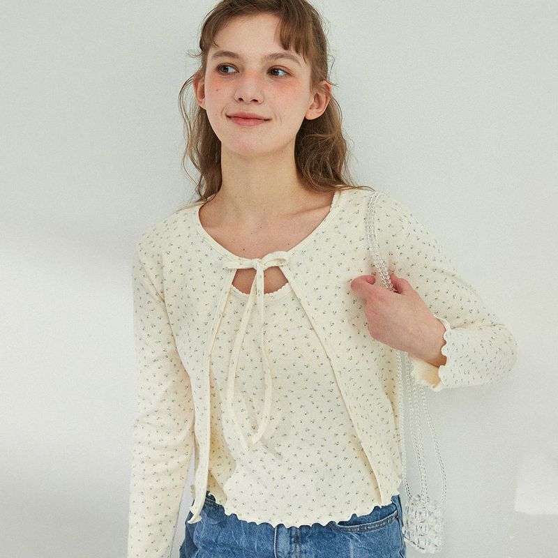 Between A and B（ビットウィーンエーアンドビー）の「RIBBON PUNCHING CARDIGAN_CREAM（）」