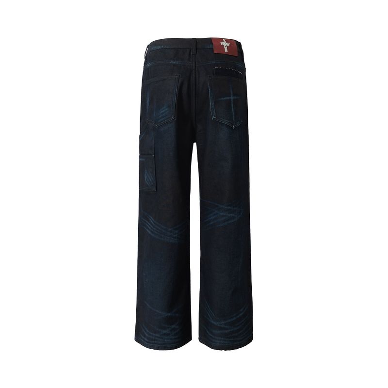 COATED KNIFE-SCRAPED HAND-WIPED DISTRESSED BOOTCUT JEANS