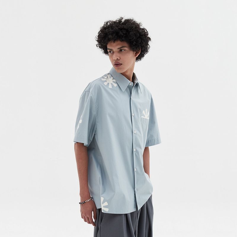 DNSR（ディーエヌエスアール）の「sunflower half shirts blue（Tops）」