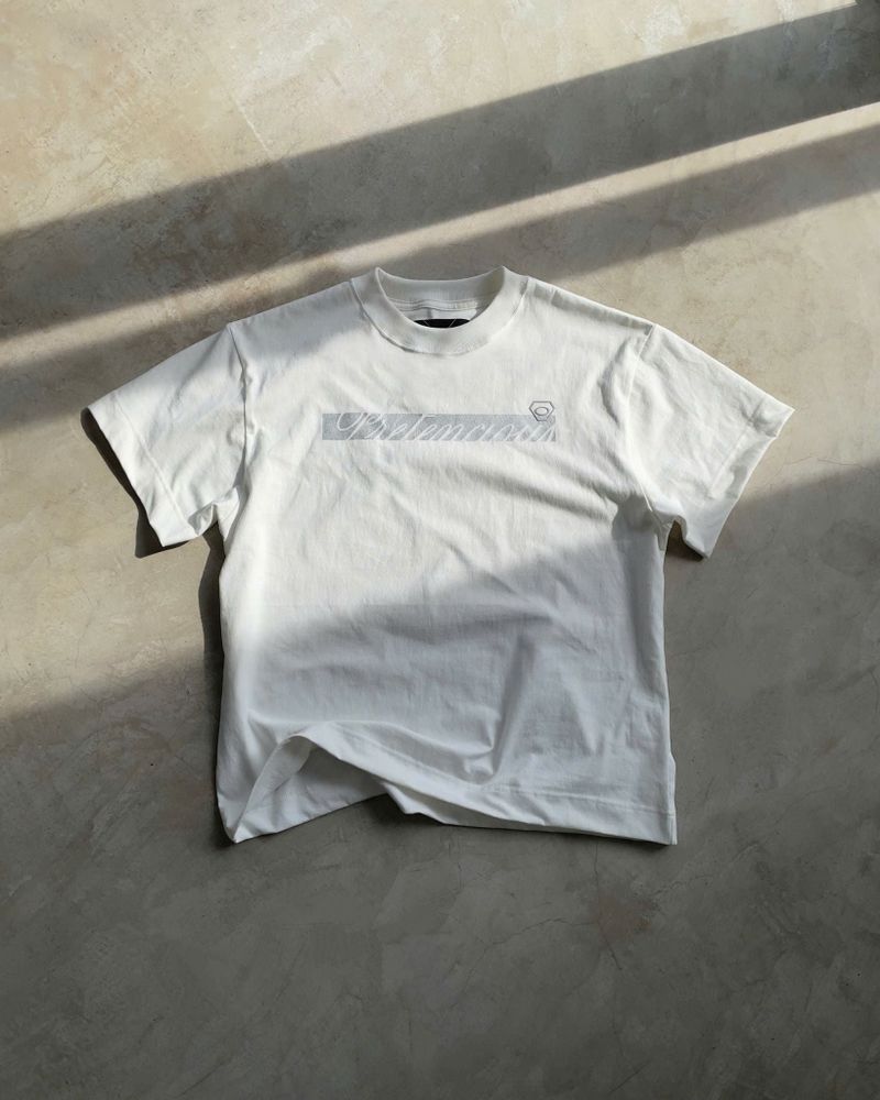 KMC "PRETENCIOUS" White Boxy Fit T-Shirt