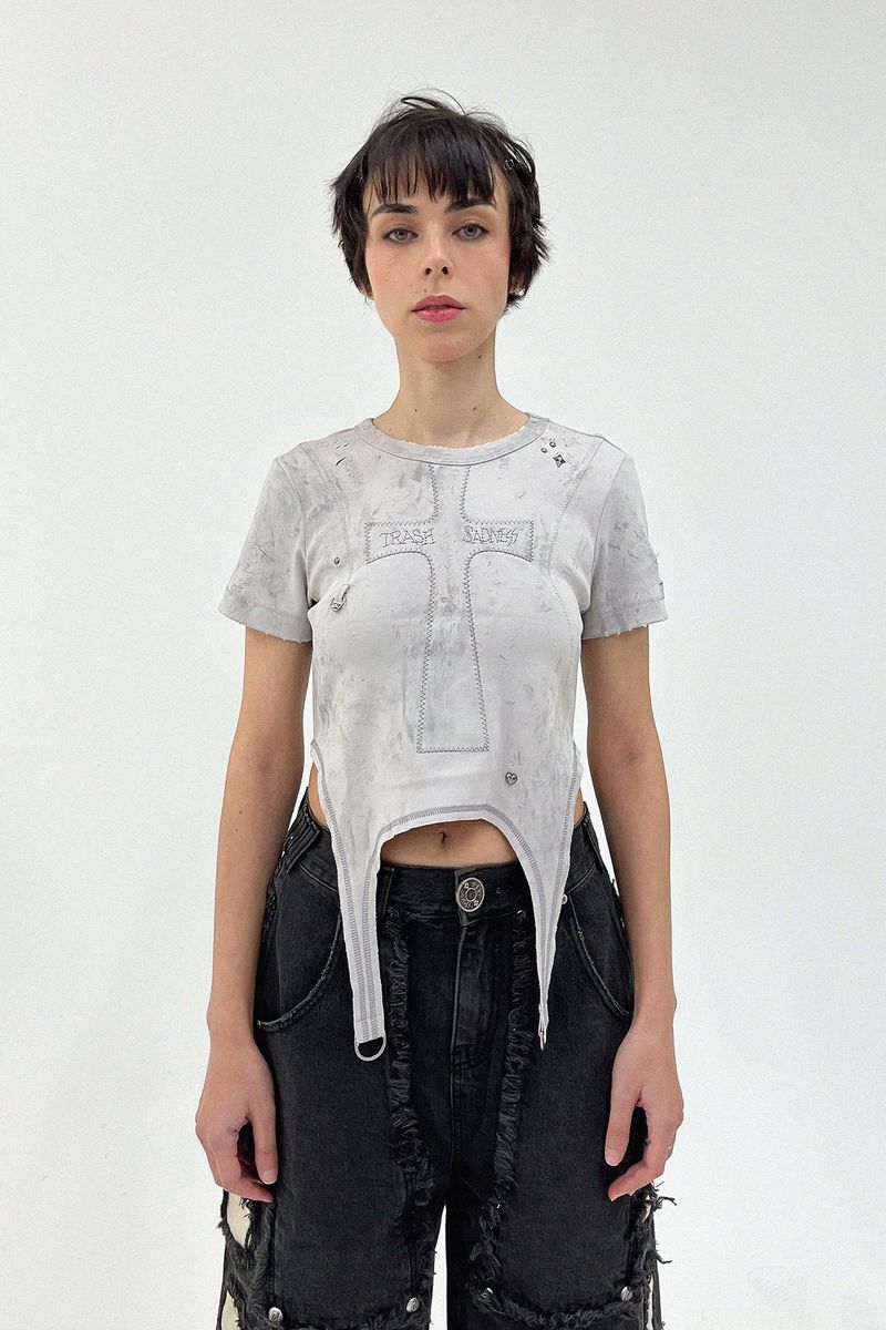 SKOOT HANDMEDOWNS（スクート ハンドミーダウンズ）の「サッドネスTシャツ（トップス）」
