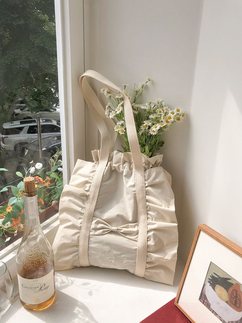 ovuni（オーブニ）の「Ruffle drawstring bag_ivory（Bags）」