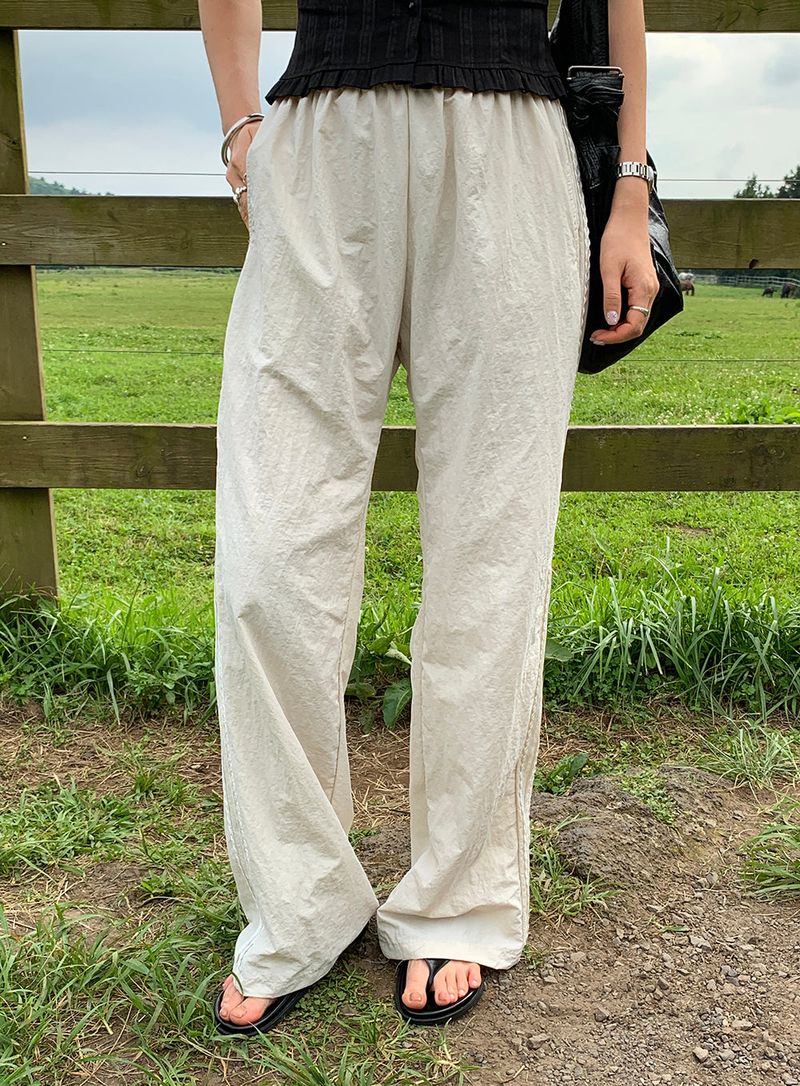 [MADE] Rollton nylon lace track bendable pants