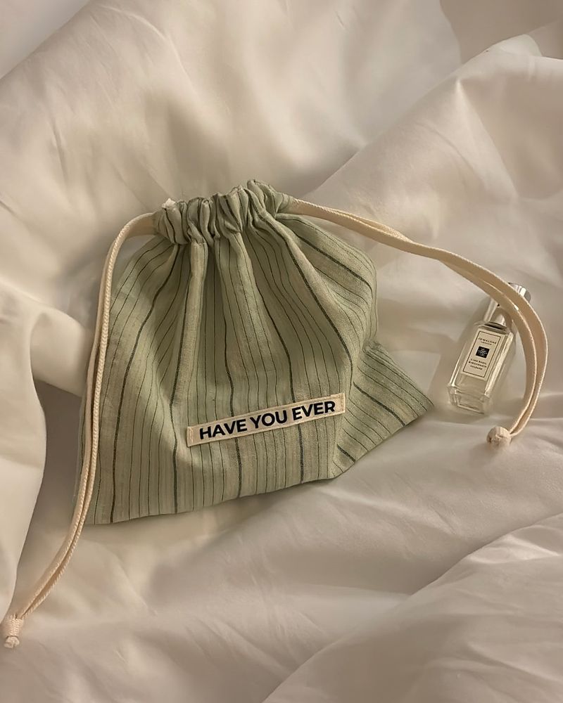 Pattern string pouch - mint stripe , M size