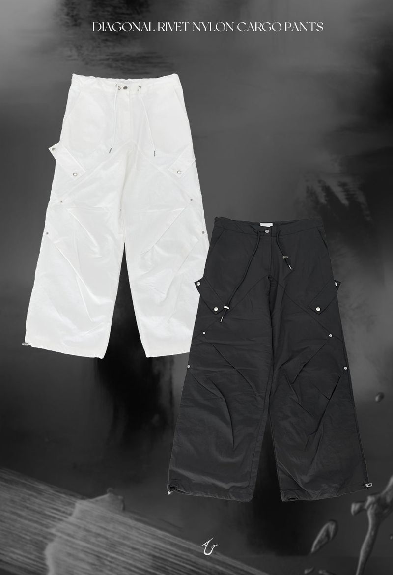 URBAN UNIQUE（アーバンユニーク）の「diagonal rivet nylon cargo pants (2color)（Pants）」