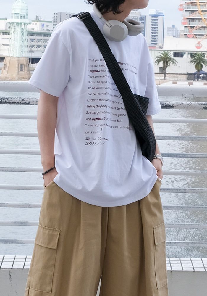SEMIKAJI(セミカジ)の「DE Lettering Printing 1/2 T(Tops)」