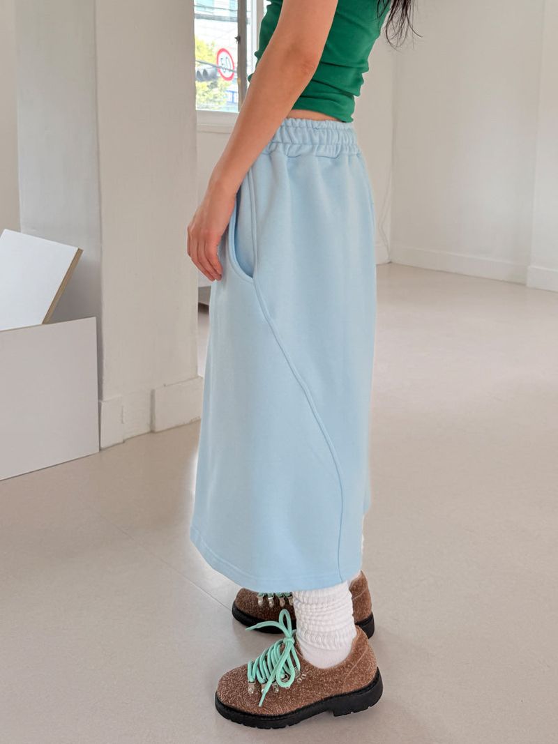 curved bermuda pants