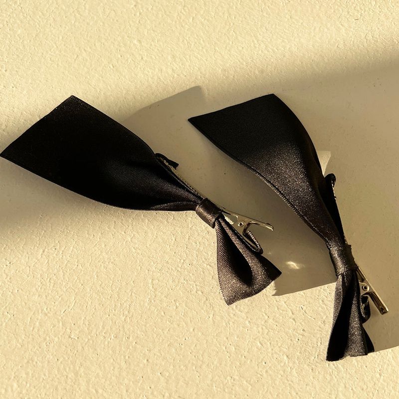 MOSXE（モスクス）の「Black ribbon tie hair pin (2set)（Hair Accessories）」
