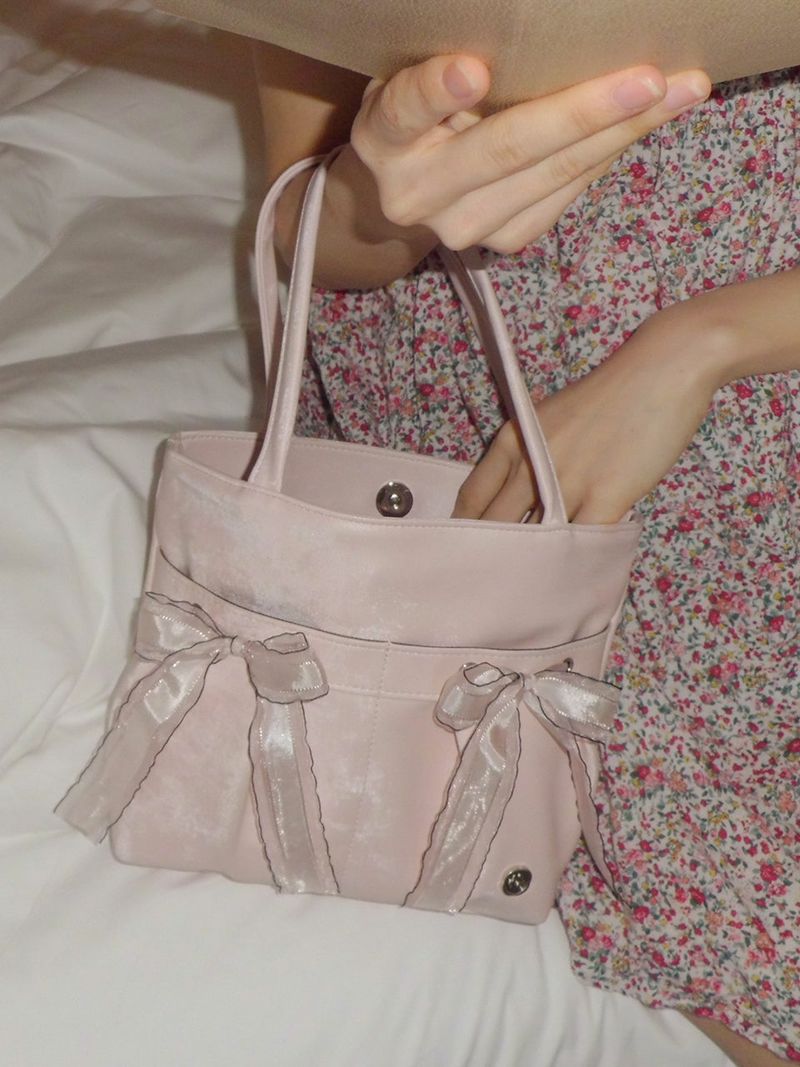 ovuni（オーブニ）の「Mini easy ribbon bag_pale pink（Bags）」