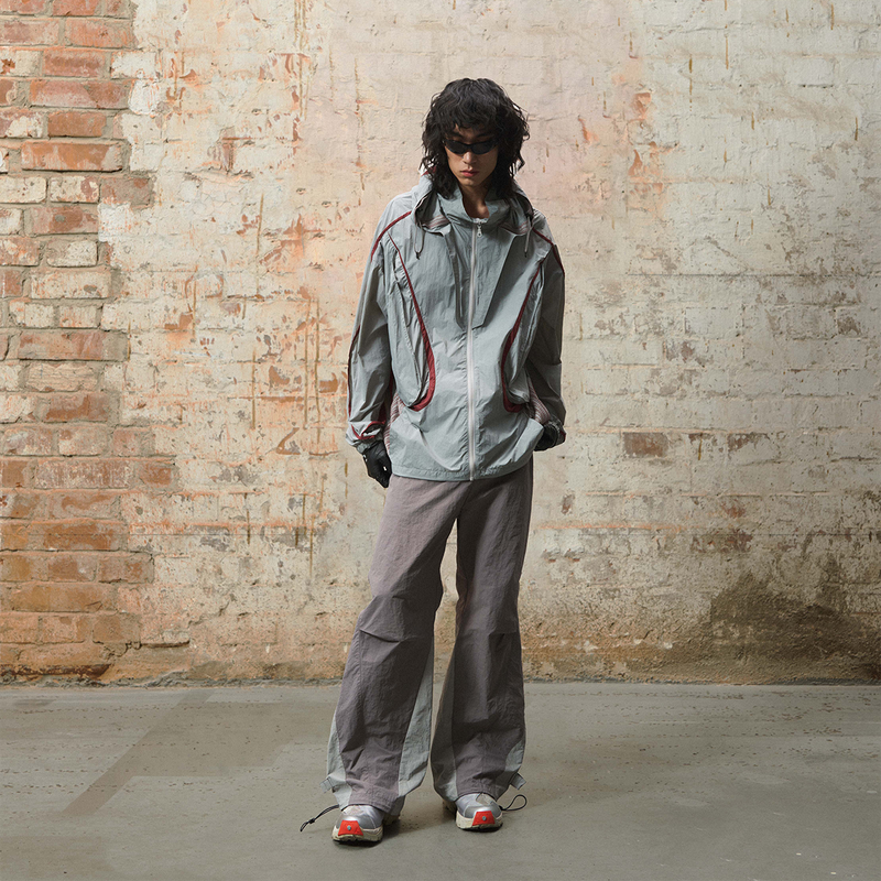 RELABEL 24SS ‘Traveller’ Two-tone Nylon Trousers With Split Drawstring And Linear Body Structure