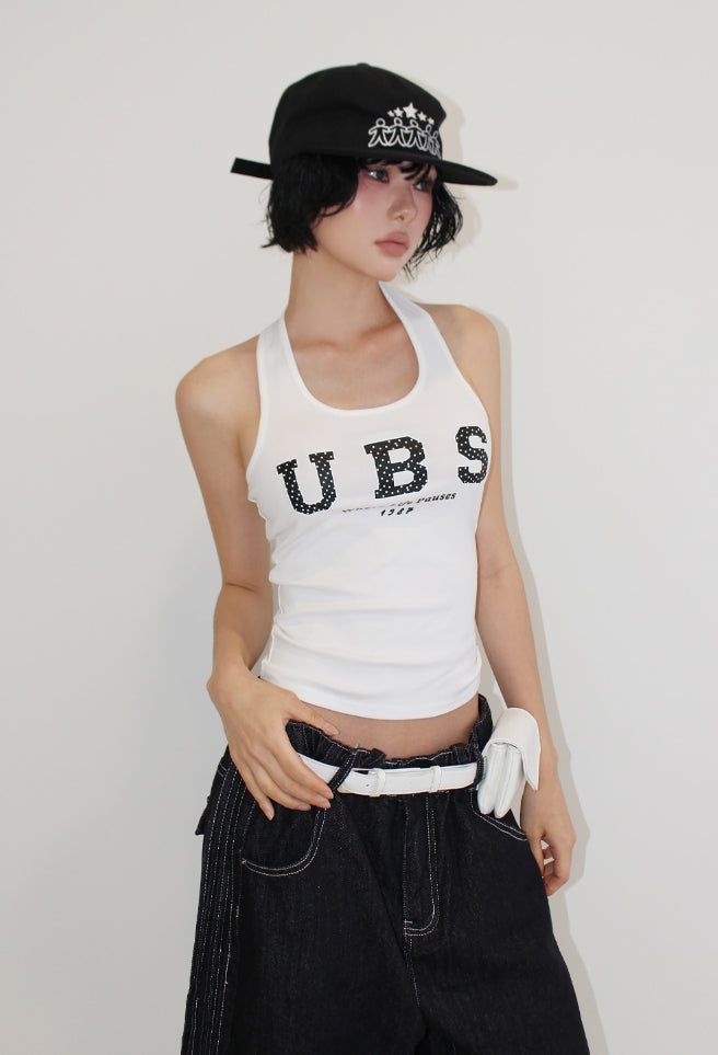 AAKE(アケ)の「UBS DOT HALTER TOP(Tops)」