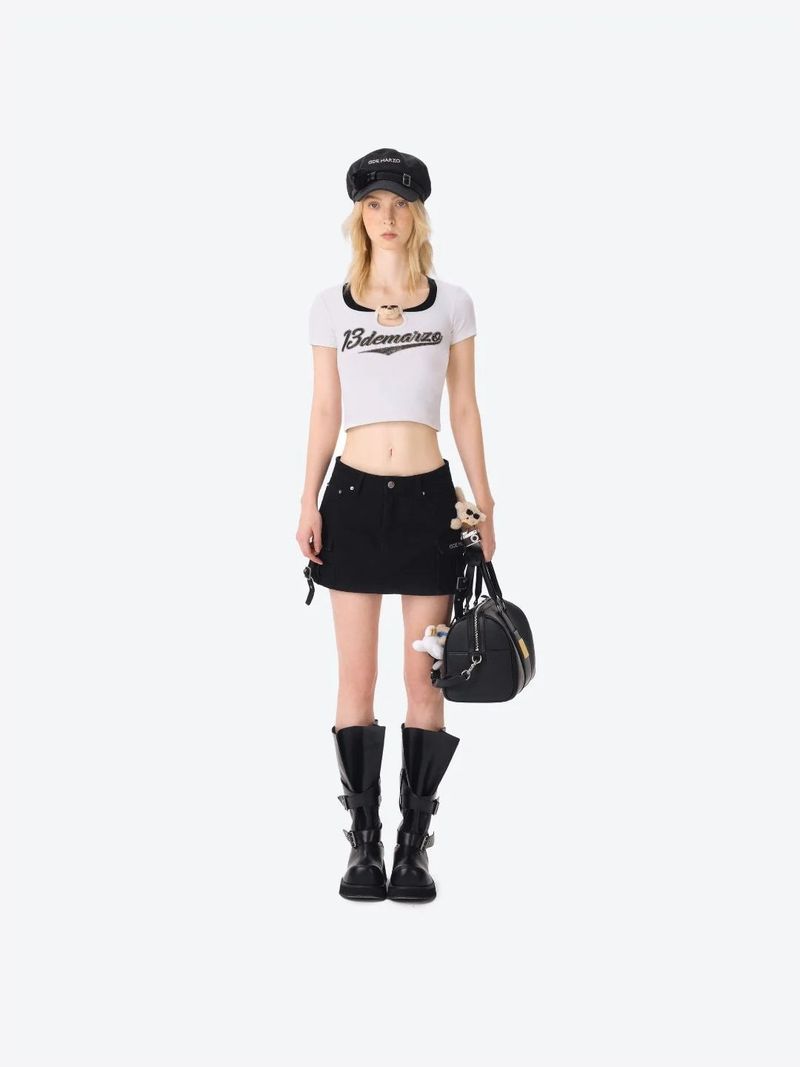 13DE MARZO（トレセ・デ・マルゾ）の「13DE MARZO Camera Bear Cargo Skirt Black（Skirts）」