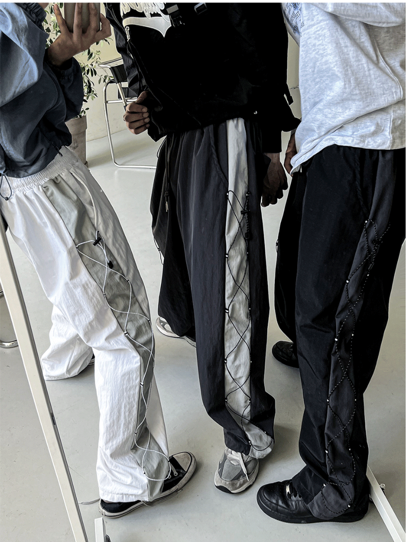 COSYHARU（コシハル）の「cross string nylon pants（Pants）」