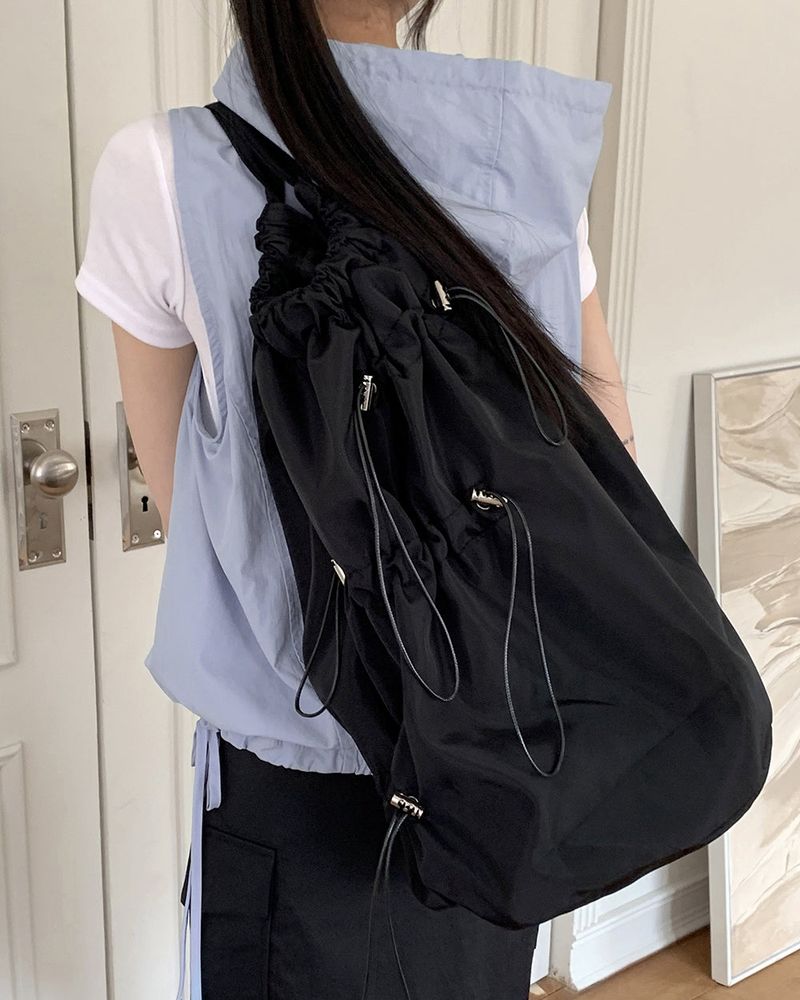 WONDER WONDER(ワンダーワンダー)の「Shope Nylon String Messenger Cross Big Backpack(Bags)」