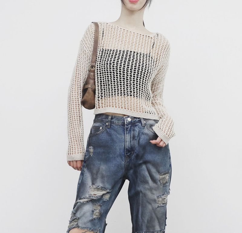 a see-through cropped knitwear