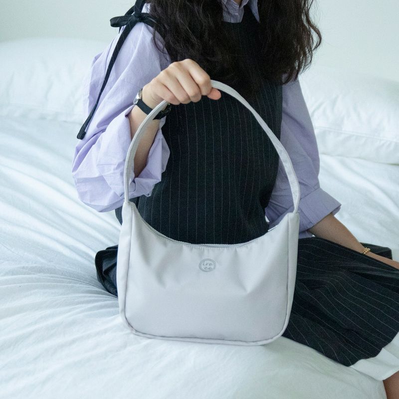 Iroco（イロコ）の「nylon mini hobo bag_cool grey（Bags）」