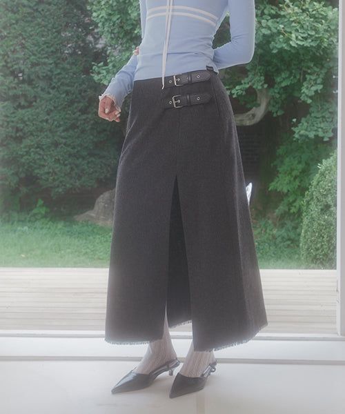 ZIZEMUSEUM(ジゼミュージアム)の「BUCKLE FRINGE LONG SKIRT (CHARCOAL)(Skirts)」