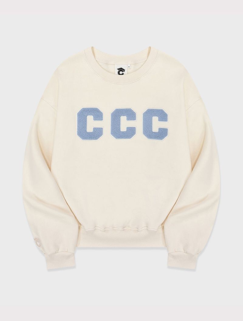 CONCEPT COLLEGE（コンセプトカレッジ）の「CCC Skyblue Patch Sweatshirt / Ivory [Unisex]（Tops）」