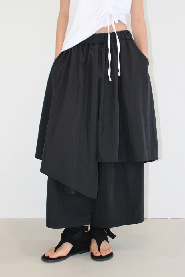 AAKE(アケ)の「SPLIT LAYERED PANTS(Pants)」