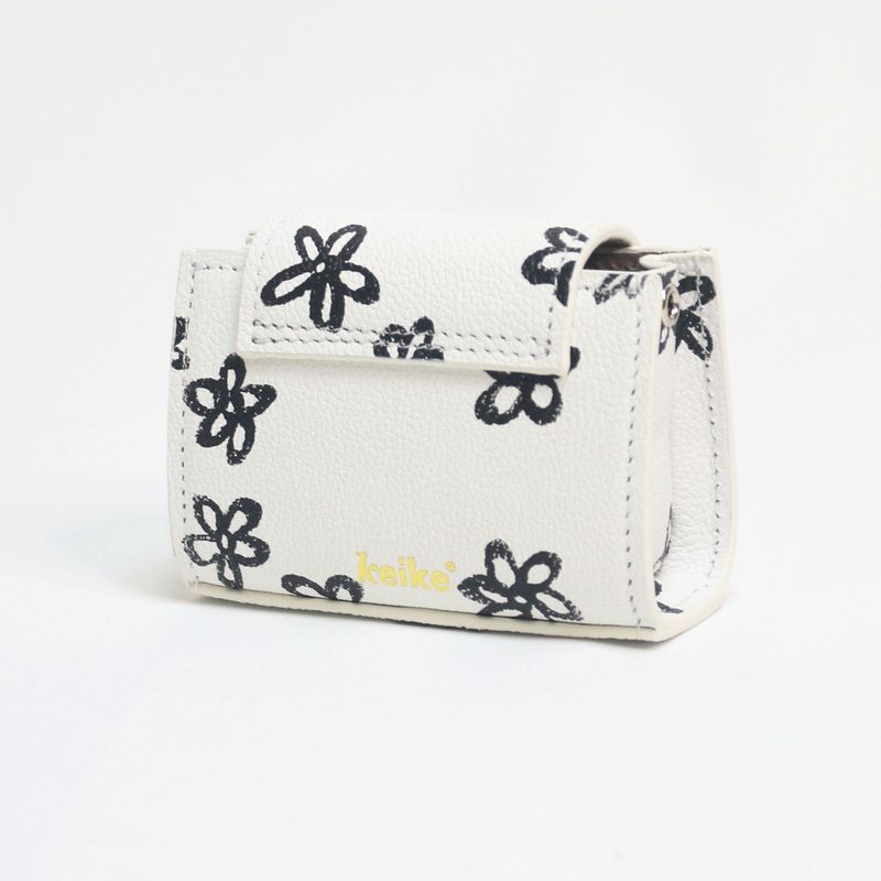 shape of' microbag - black flowers