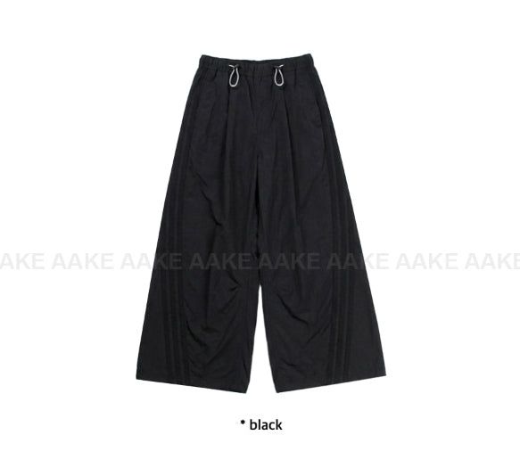 CURVED TRACK NYLON PANTS
