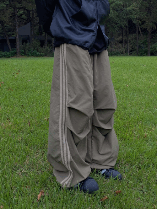 UNAIDUN（アネイダン）の「Triple Tape Parachute Nylon Pants 2C（Pants）」