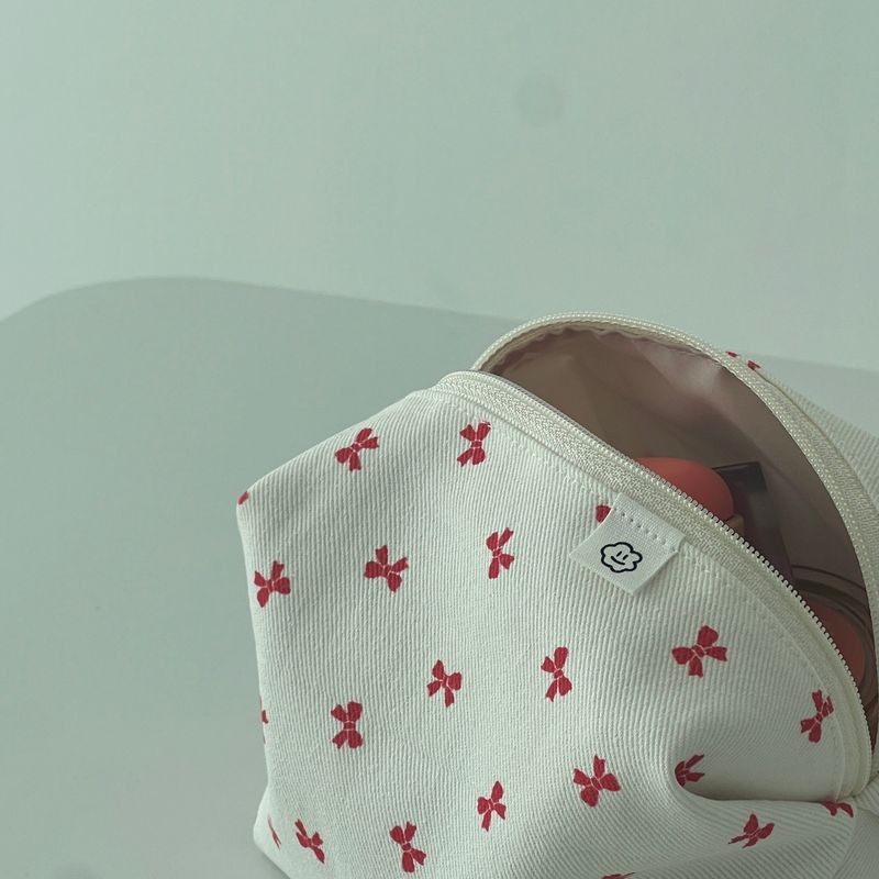 RED RIBBON ZIPPER POUCH