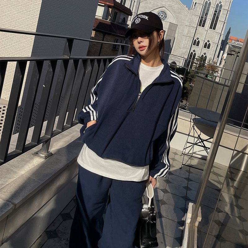 ULAN（ユレン）の「ラインハーフチャックフリース（Tops）」