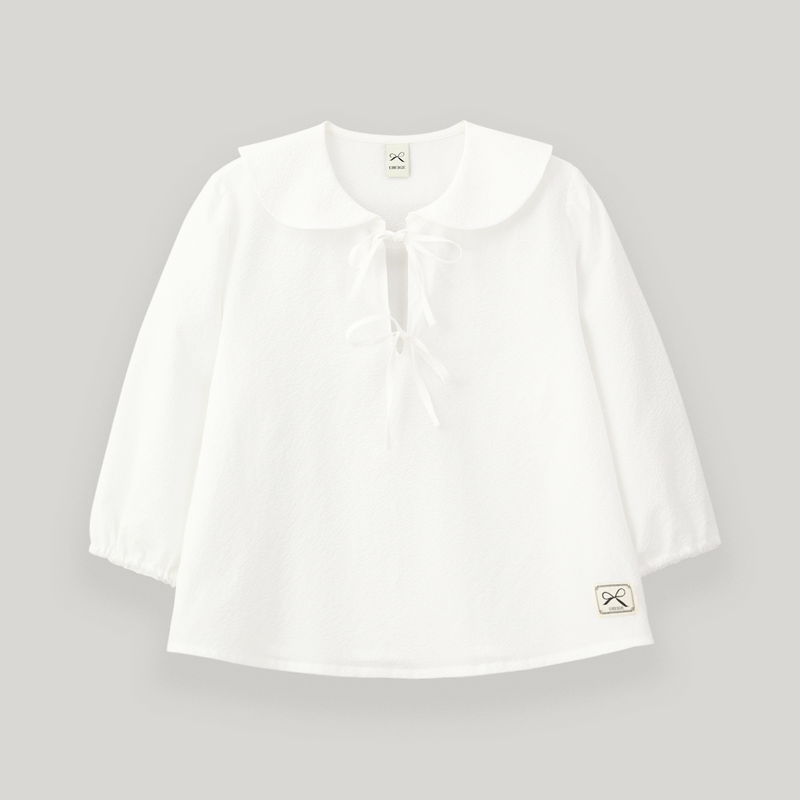 UBEIGE(ユーベイジ)の「White Seersucker Ribbon Blouse(Tops)」