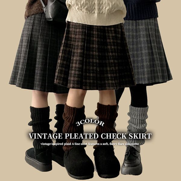 hijjoo（ハイチュー）の「Bomi A-line pleated check midi skirt （Skirts）」