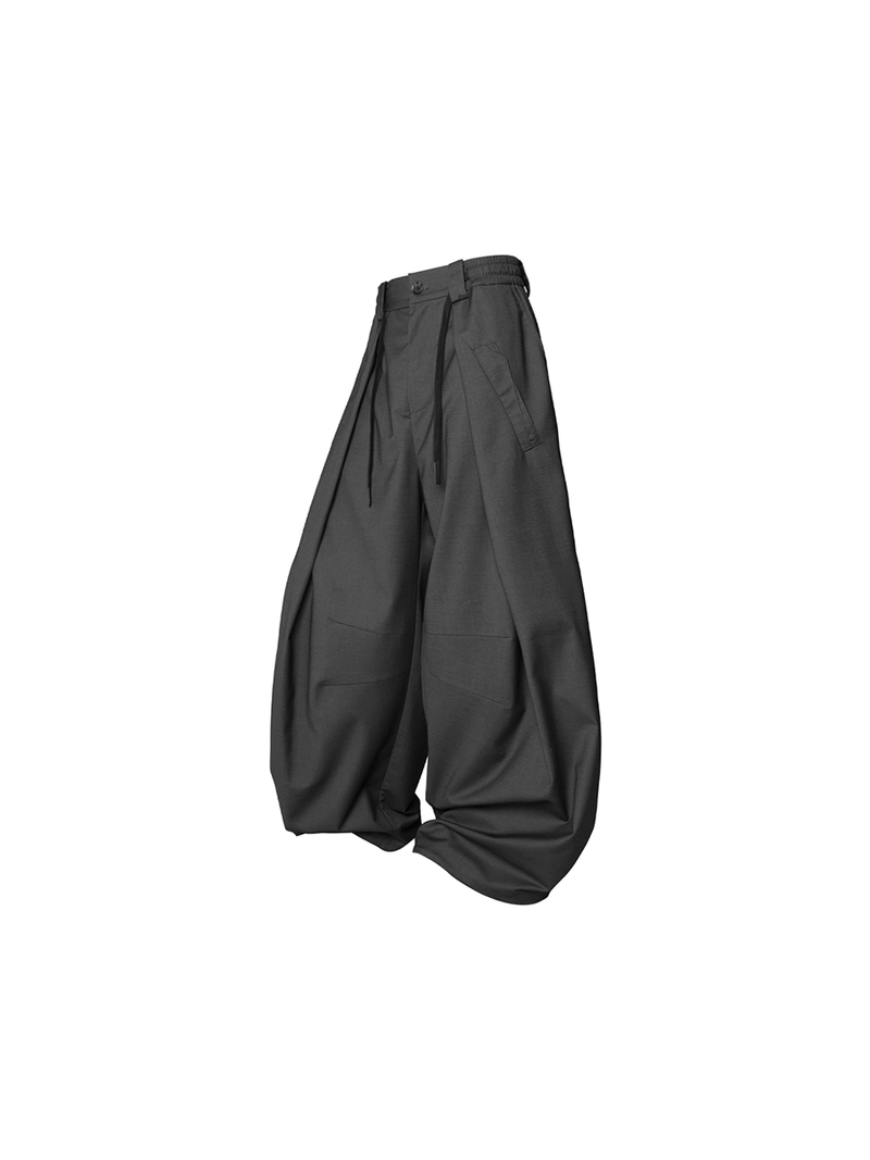 RELABEL（リレーベル）の「RELABEL Element of Time (cont'd) Pleated Double-waisted, Draped Scimitar-contoured Suit Trousers（Pants）」