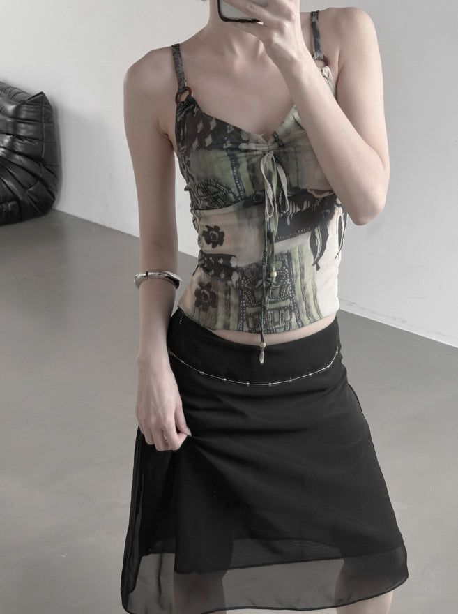 mnem（ムネム）の「Ethnic Mesh Print Sheer Sleeveless（Tops）」