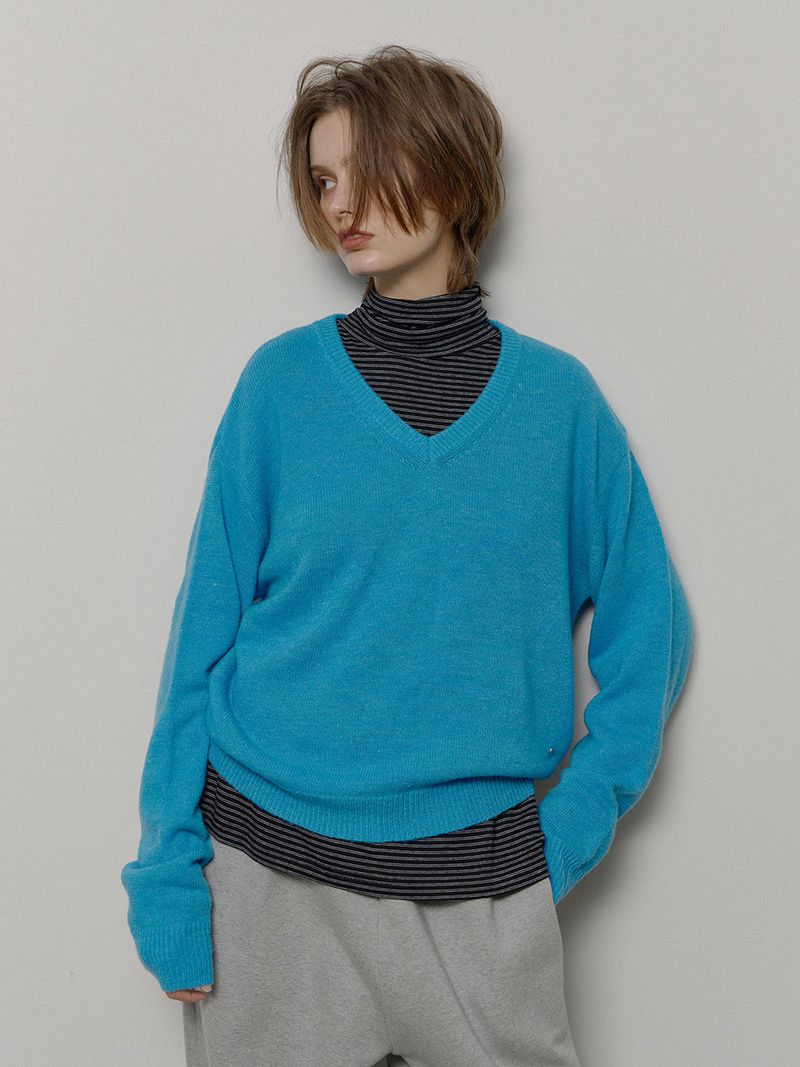 LONQUE（ロンク）の「ウールVネックニット (ブルー)（トップス）」