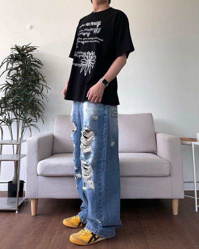 Destroyed brush denim pants