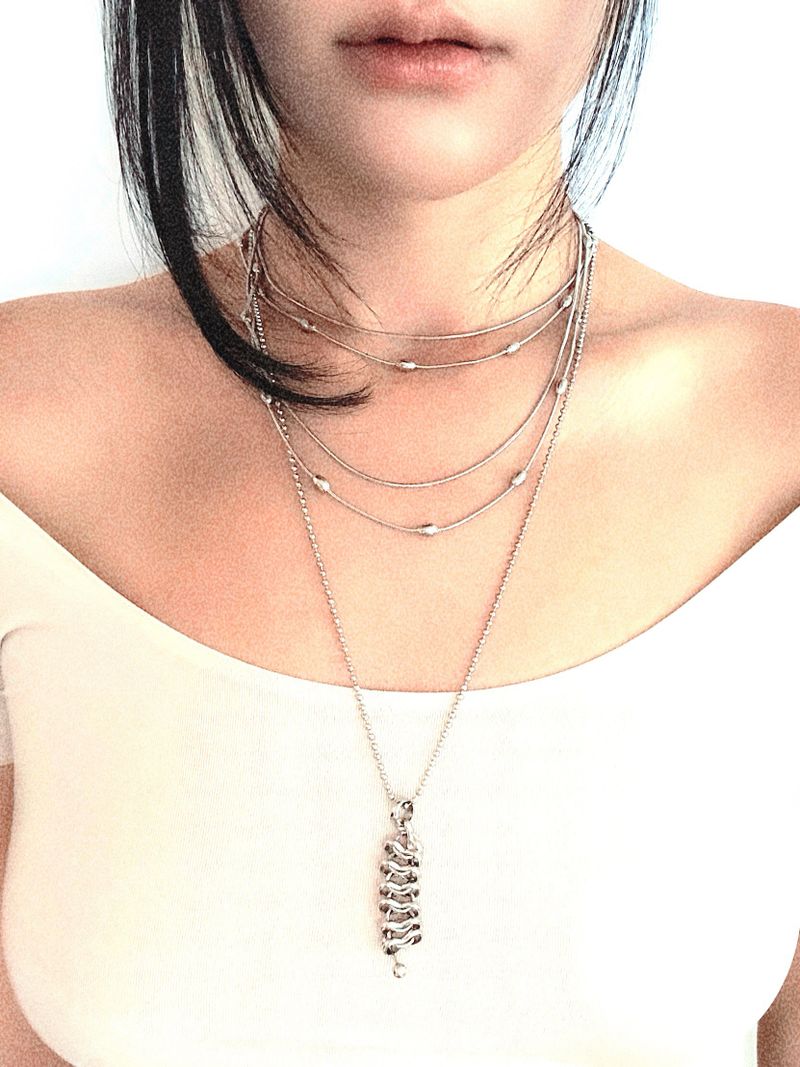 BUZZERBE（ブザービー）の「Liquid Bead Layer Necklace（Accessories）」