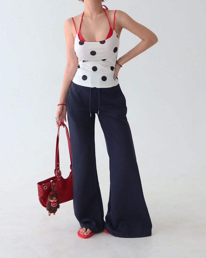 Red colored royal dot sleeveless shirt
