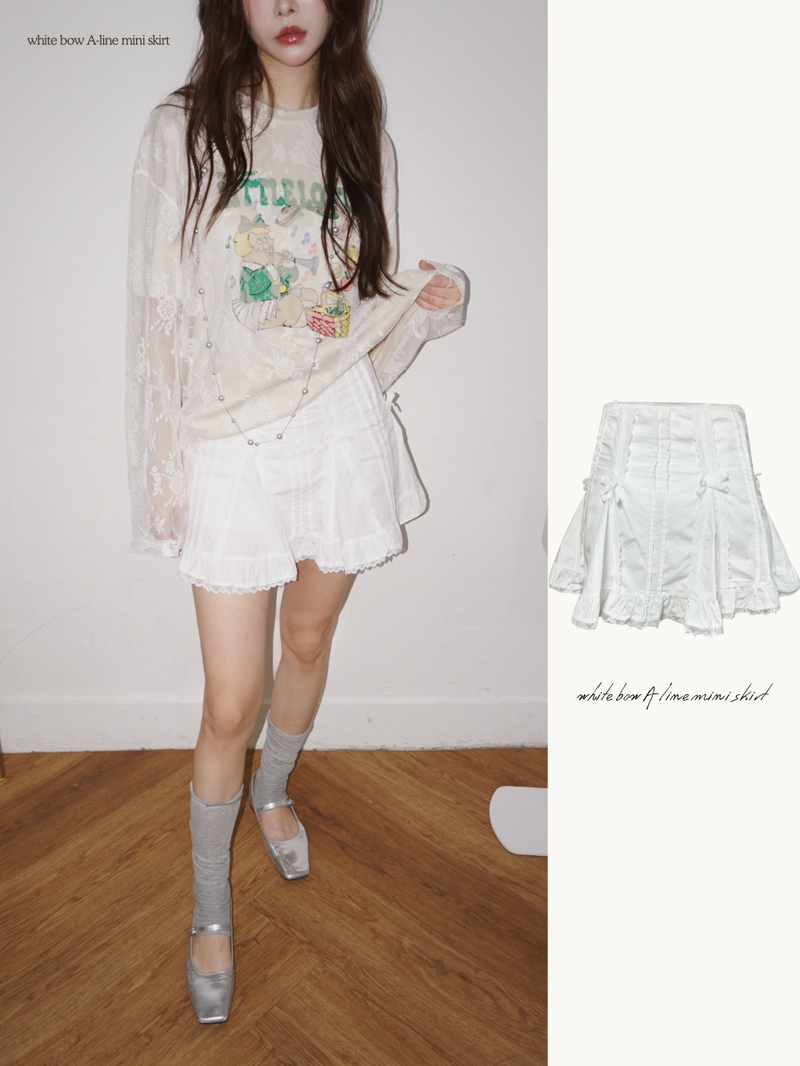 dereborujo（ドレボルゾー）の「white bow A-line mini skirt（Skirts）」
