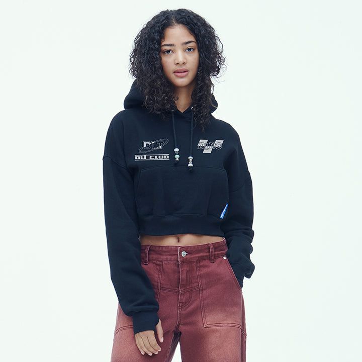 DILETTANTISME（ディレッタンティズム）の「RACING WARMER CROP HOODIE (BK)（Tops）」