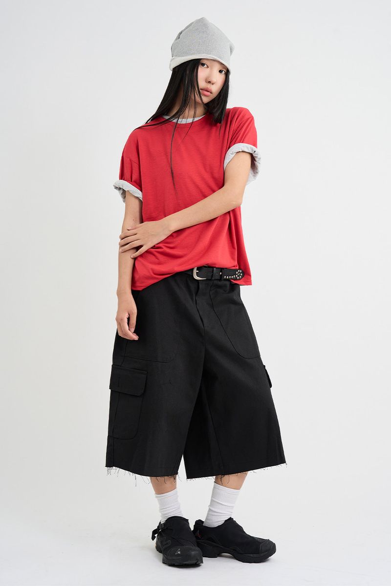 Rough-cut Bermuda shorts